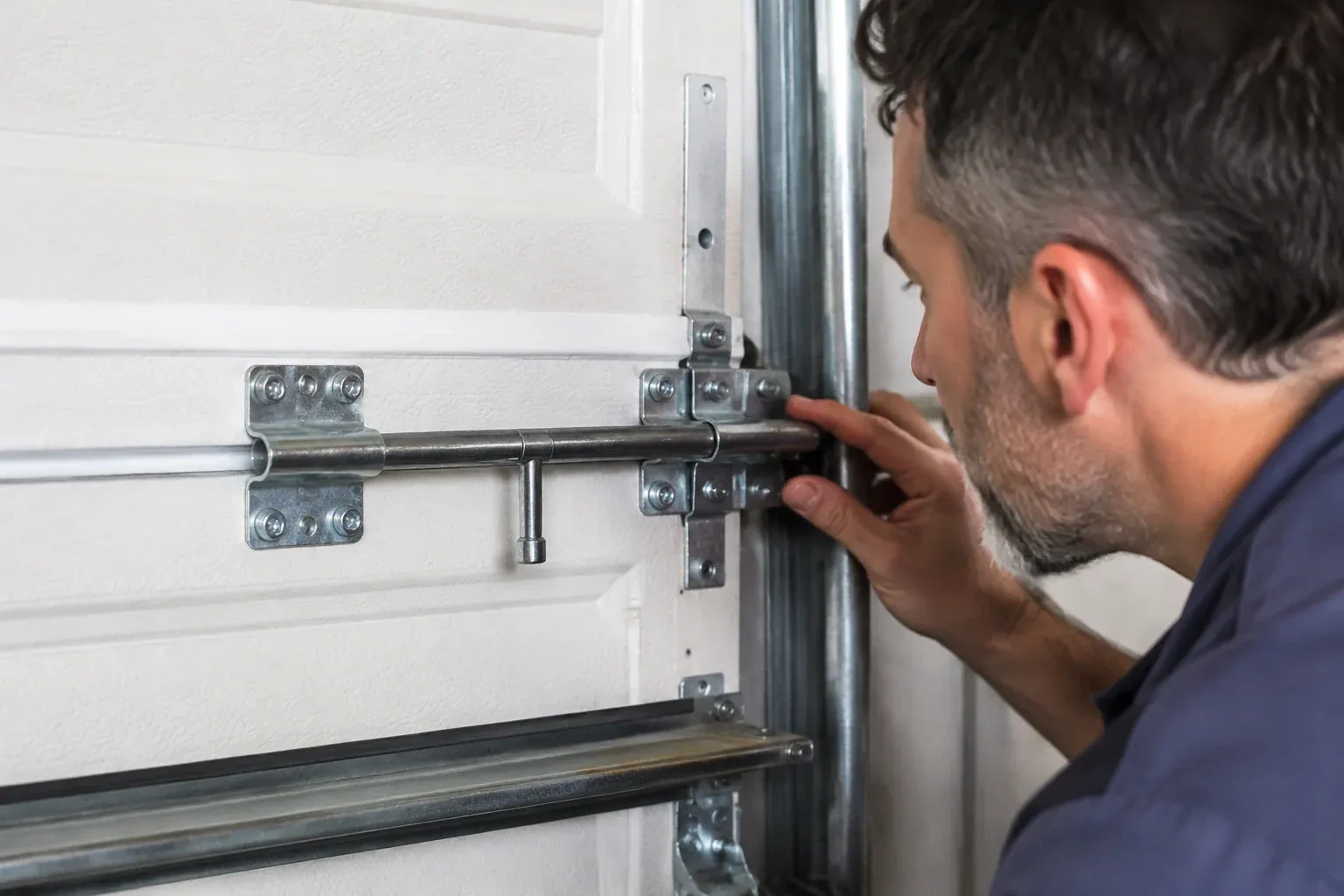 Illustrative garage doors scene; not an actual job — Garage Door Manual Lock Repair, Strathroy-Caradoc